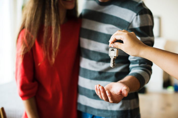 a couple receiving keys